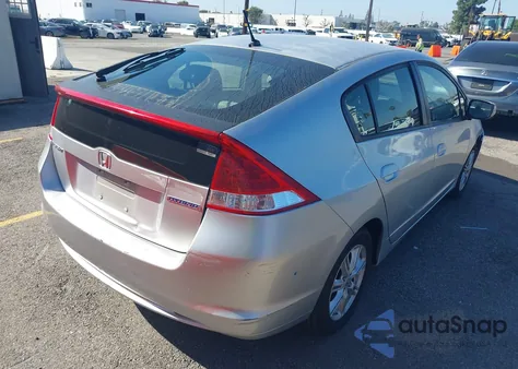 2011 Honda Insight Ex z USA, uszkodzony, nr VIN JHMZE2H77BS012125